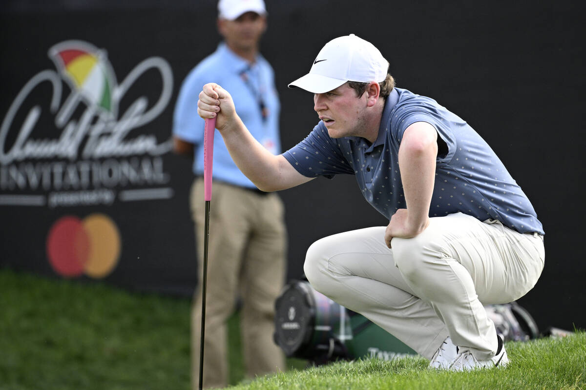 Robert MacIntyre, of Scotland, lines up his putt on the 16th green during the final round of th ...
