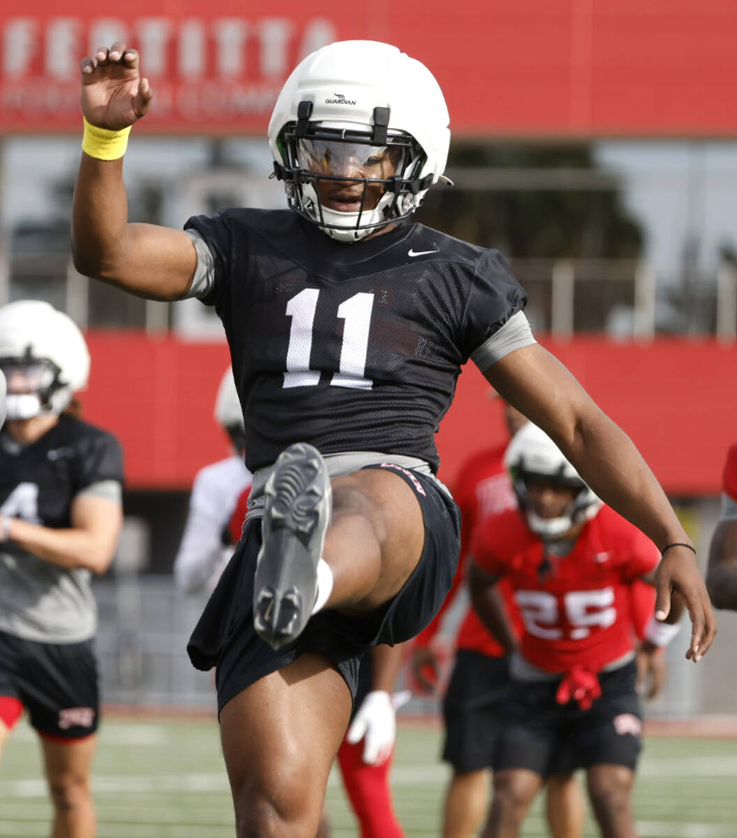 UNLV quarterback Alex Orji (11) stretches during team's first spring practice, on Thursday, Mar ...