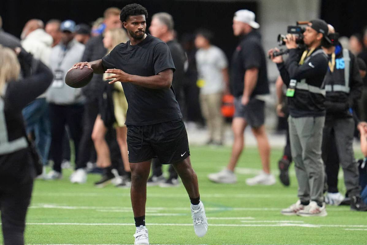 Colorado quarterback Shedeur Sanders (2) takes part in passing drills during Colorado's NFL foo ...