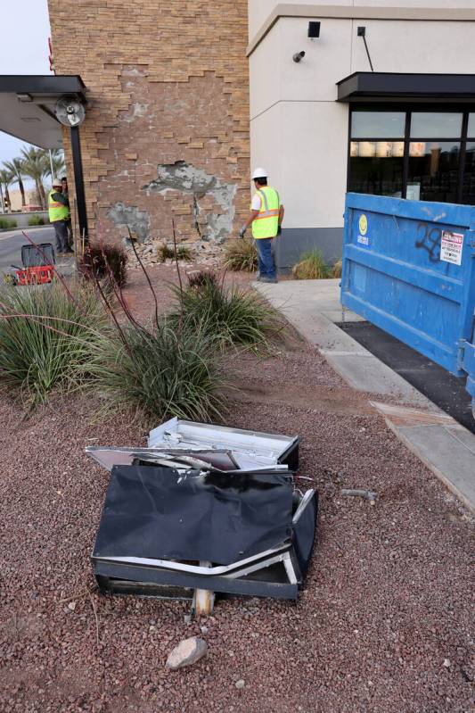 A smashed “do not enter” sign is seen as workers make preparations to repair a Ch ...
