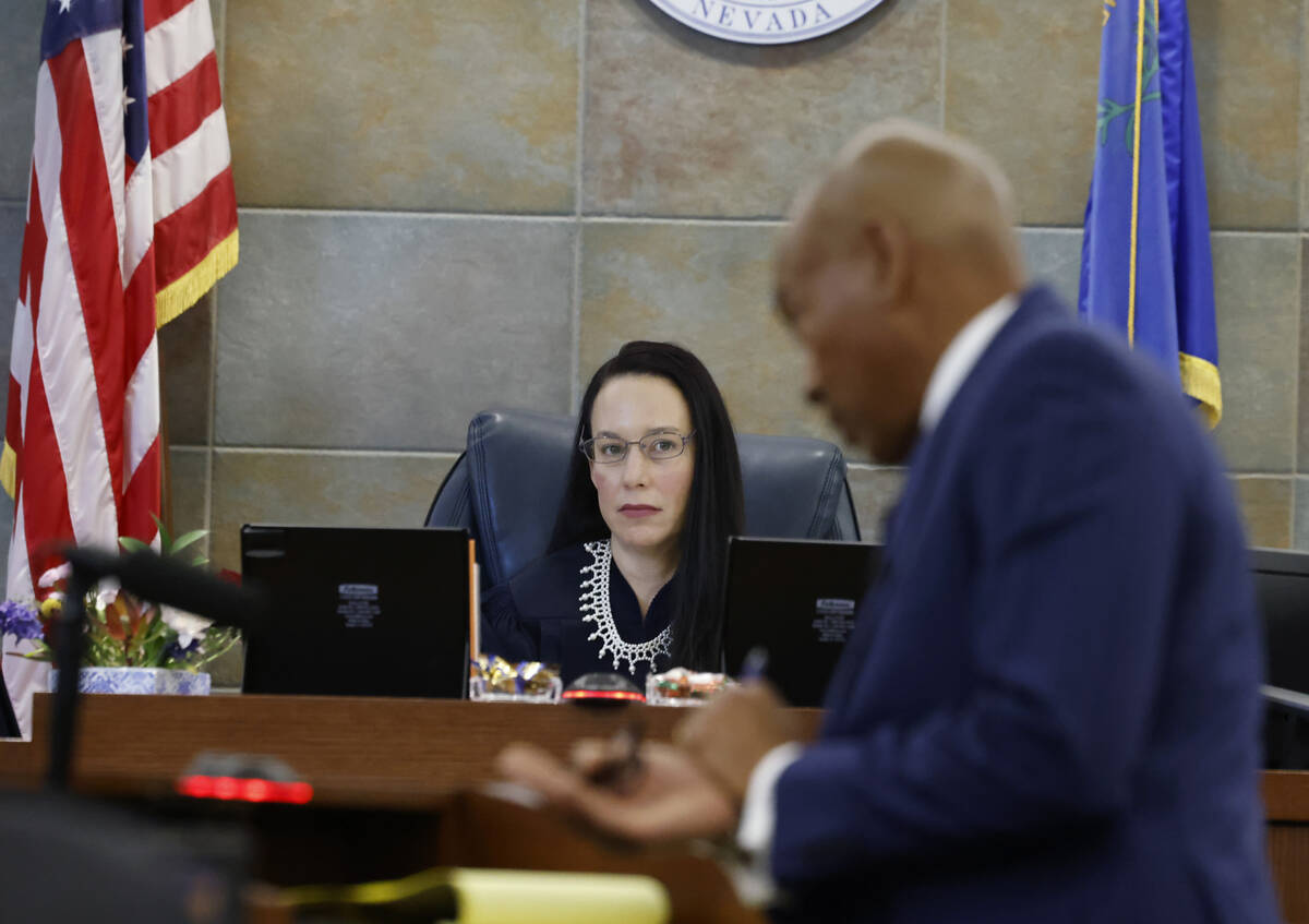 Judge Nadia Krall watches as attorney Carl Arnold, right, representing Duane Davis, who is faci ...