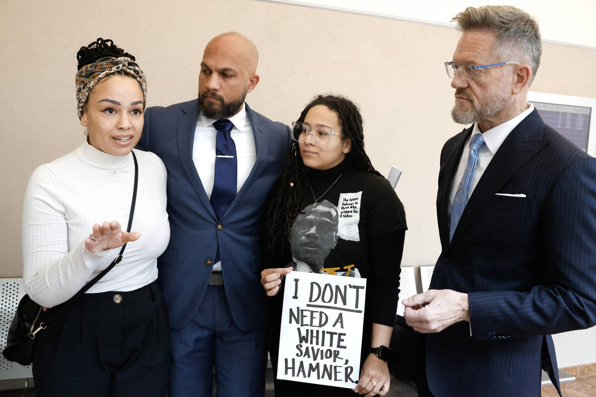 Metropolitan Police Department Sgt. Kevin Menon, second left, accused of misconduct and possess ...
