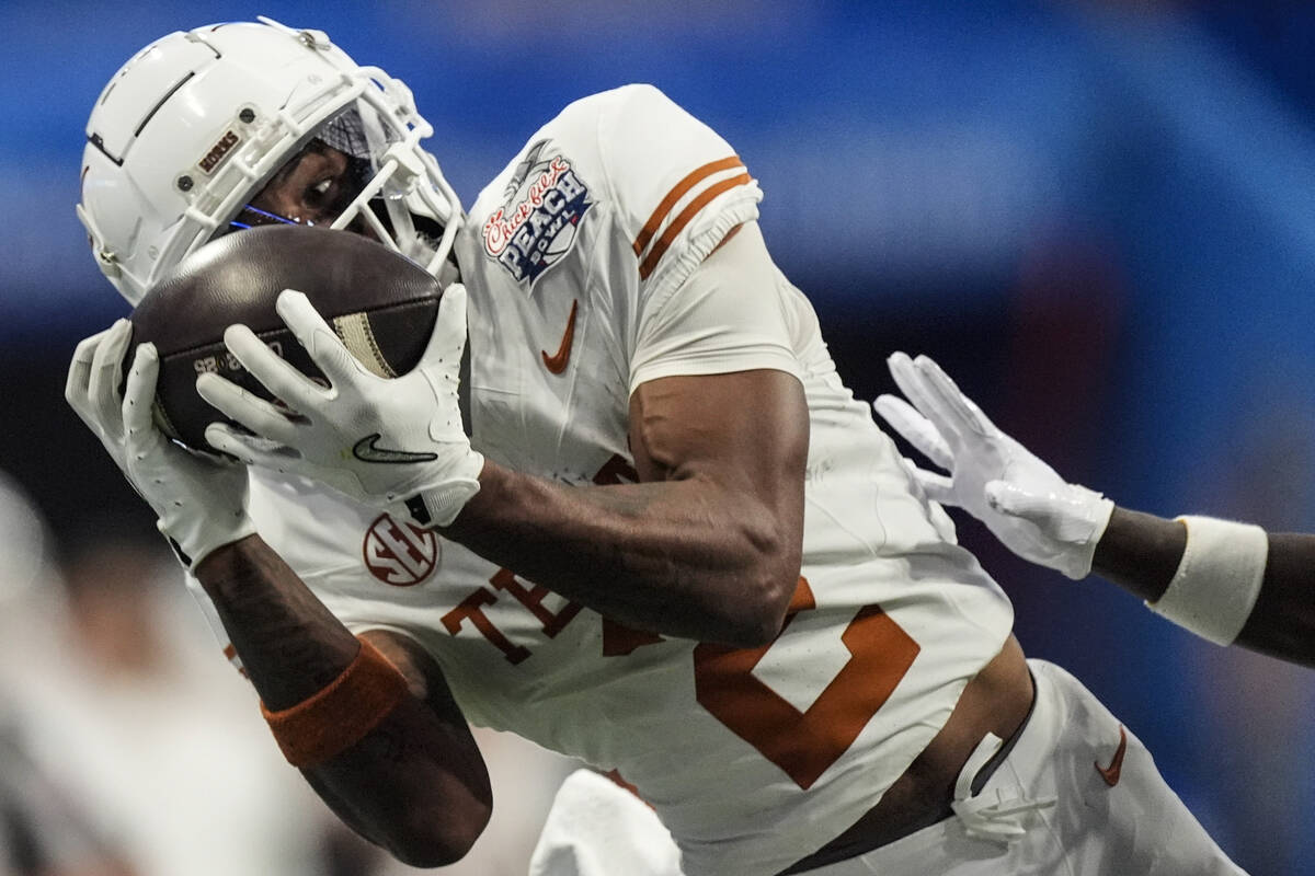 Texas wide receiver Matthew Golden (2) makes the catch against Arizona State during overtime in ...