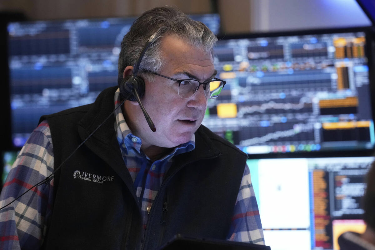 Trader John Bishop works on the floor of the New York Stock Exchange, Thursday, April 10, 2025. ...
