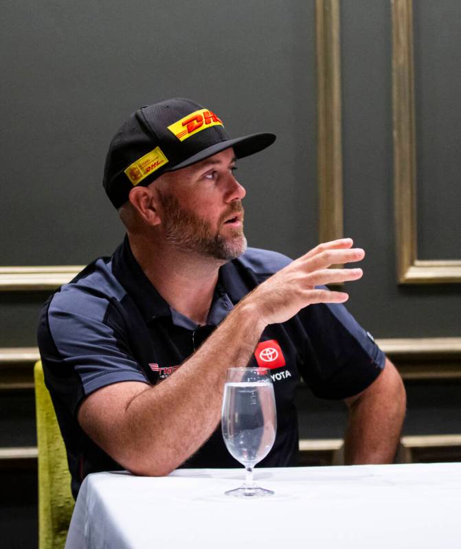 Funny car driver Shawn Langdon speaks during a press conference ahead of the NHRA Four-Wide Nat ...