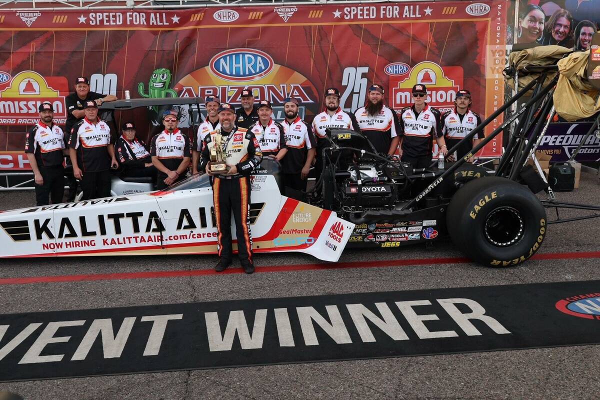 Shawn Langdon poses after winning the NHRA Arizona Nationals on March 23 in Chandler, Arizona. ...