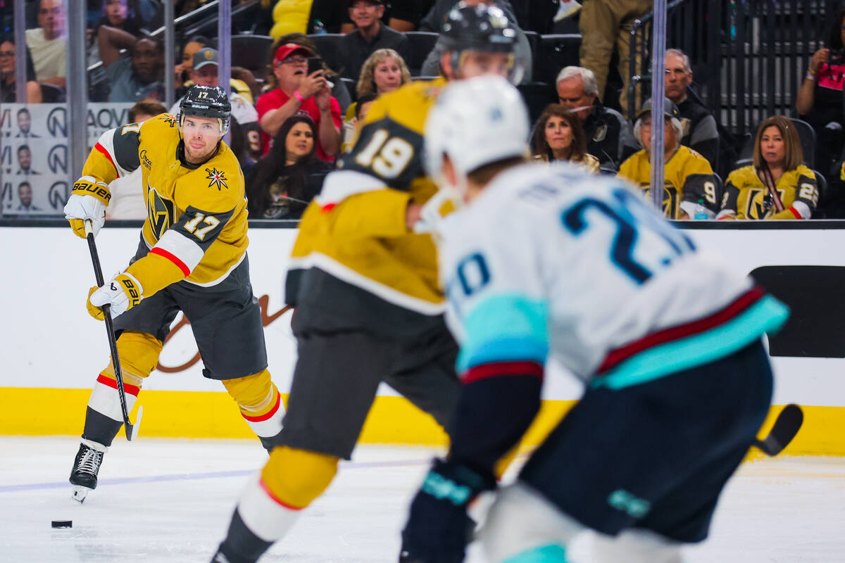 Golden Knights defenseman Ben Hutton (17) skates the puck during an NHL hockey game between the ...