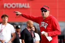 UNLV football head coach Dan Mullen blows on a whistle during a team practice in Las Vegas, Thu ...