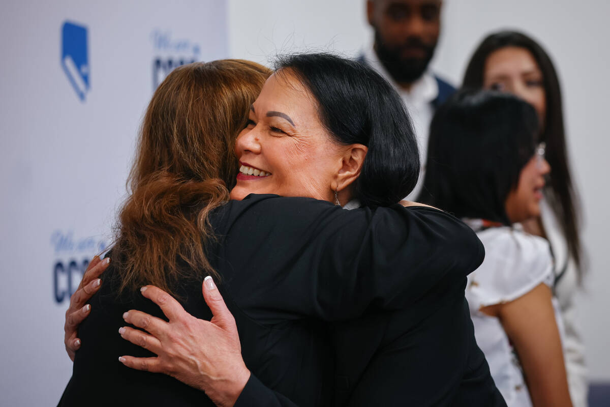 New CCSD Superintendent Jhone Ebert hugs school board trustee Linda Cavazos after her first pre ...