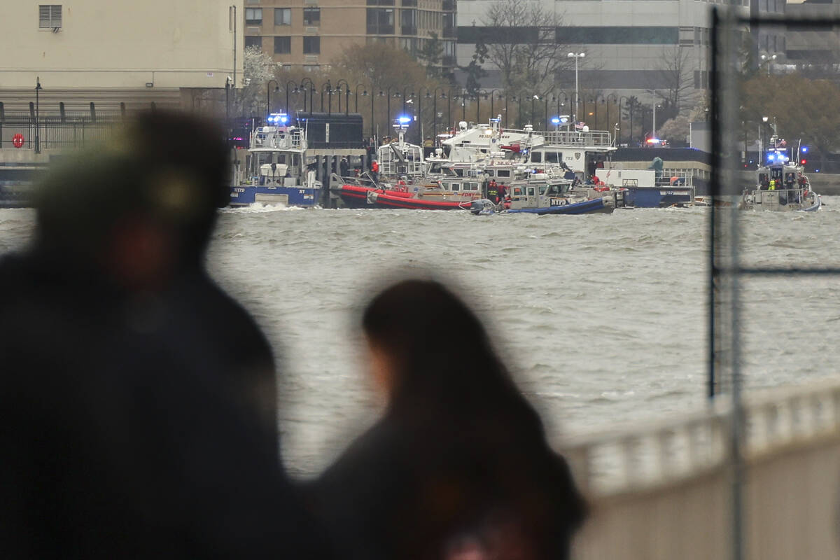 As seen from Pier 40 in New York, police and and fire crews from New York and New Jersey respon ...
