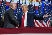 President Donald Trump, the then nominee, talks with UFC CEO Dana White at an election night wa ...