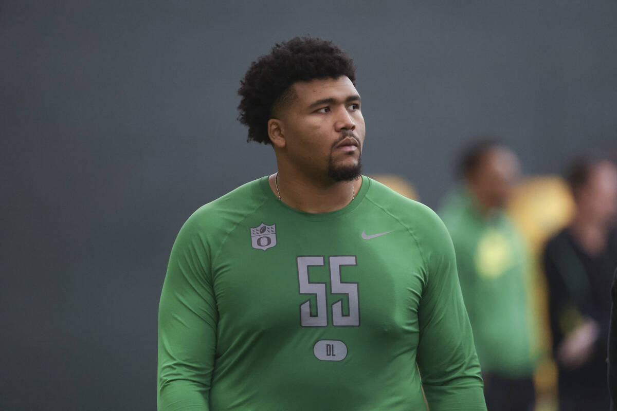 Oregon defensive lineman Derrick Harmon (55) looks on during the school's NFL Pro Day, Tuesday, ...
