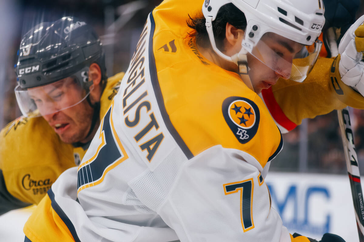 Nashville Predators right wing Luke Evangelista (77) and Golden Knights defenseman Brayden McNa ...
