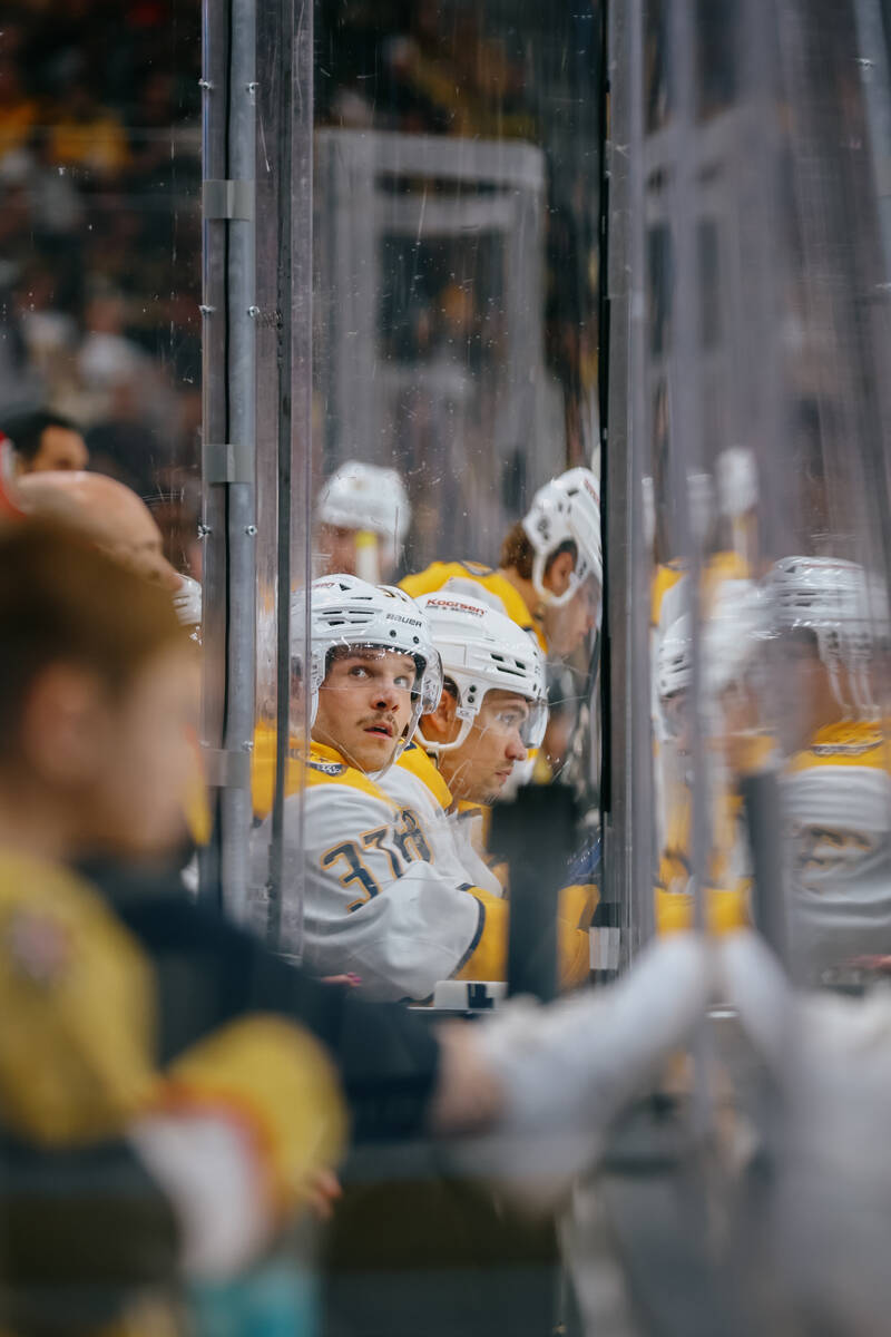Nashville Predators defenseman Nick Blankenburg (37) looks up into the crowd from the bench dur ...