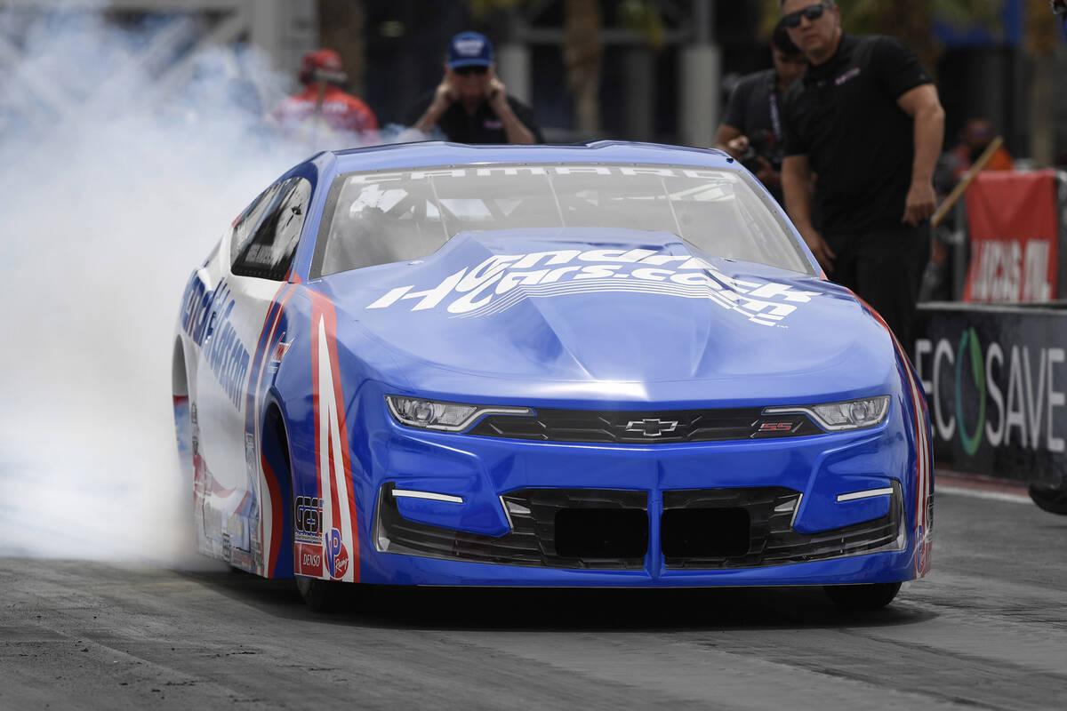 In this image provided by the NHRA, reigning Pro Stock champion Greg Anderson secured his third ...
