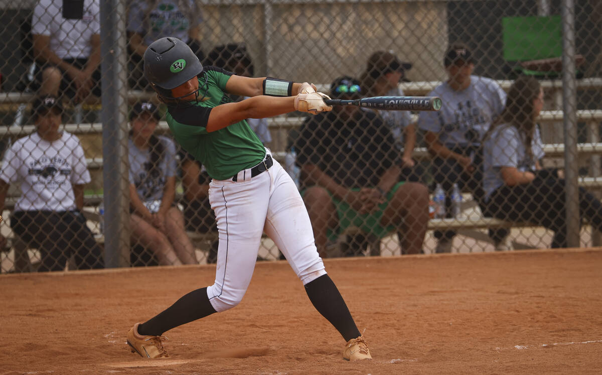 Palo Verde's Taylor Johns hits a home run against Coronado during a softball game at Palo Verde ...