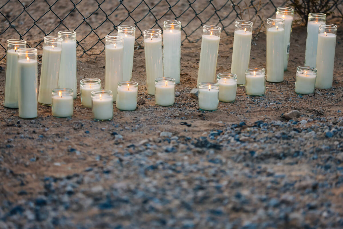 Candles are laid out during a vigil for Jordon Dodder, who died after a crash at the intersecti ...