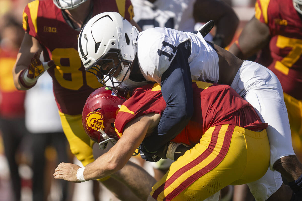 Penn State defensive end Abdul Carter (11) sacks Southern California quarterback Miller Moss (7 ...