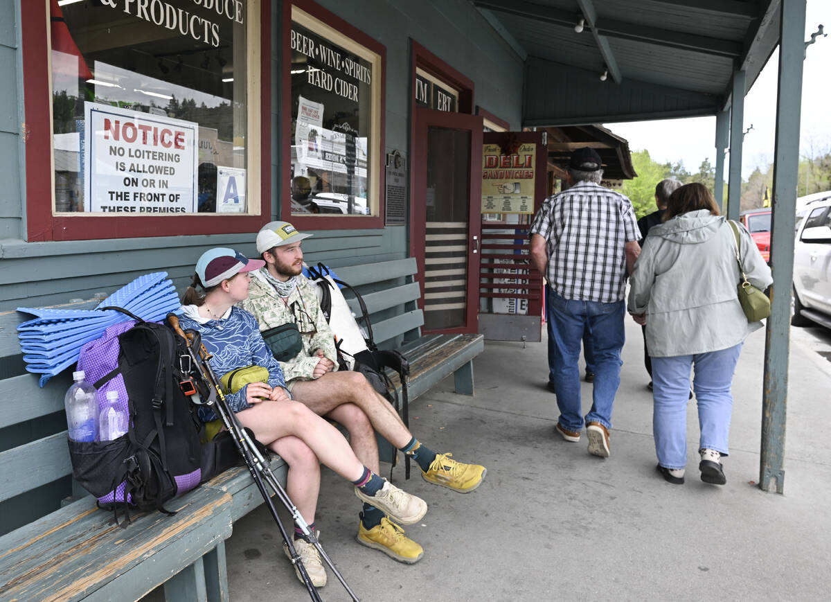 Celia Peterson, left, and Jensen Douillard wait before going on a hike Monday, April 14, 2025, ...