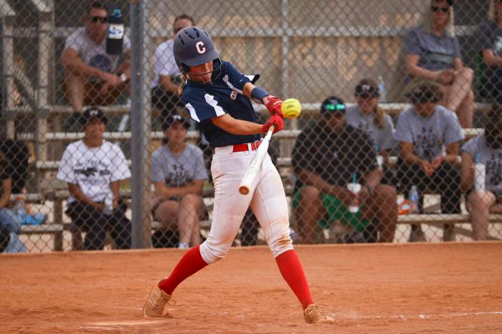 Coronado's Chase Magdaleno hits a single during a softball game at Palo Verde High School on Mo ...