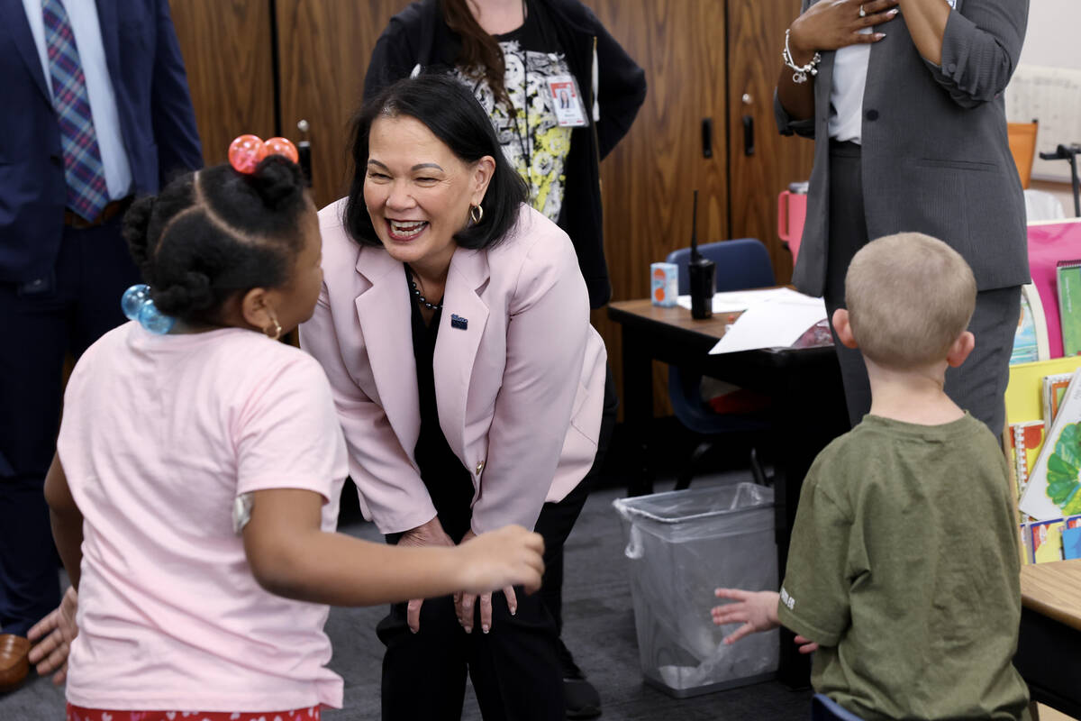New Clark County School District Superintendent Jhone Ebert visits J’Liayha Johnson in a ...