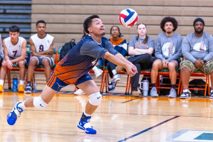 Legacy's Jacob Bay (4) digs out a return against Mojave during their 4A boys volleyball game on ...