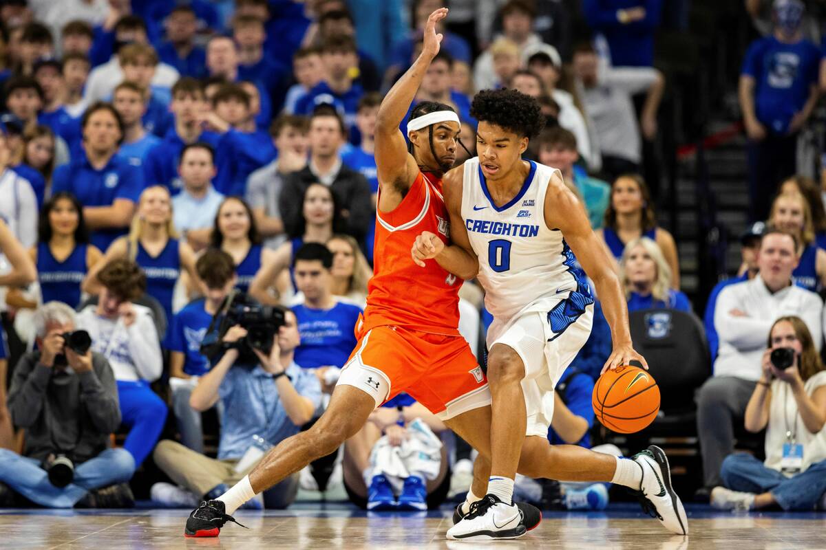 Creighton forward Jasen Green (0) drives against Texas-Rio Grande Valley guard Howie Fleming Jr ...
