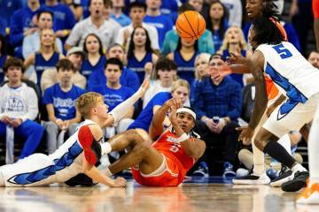 Texas-Rio Grande Valley guard guard Howie Fleming Jr. (5) passes the ball under pressure from C ...