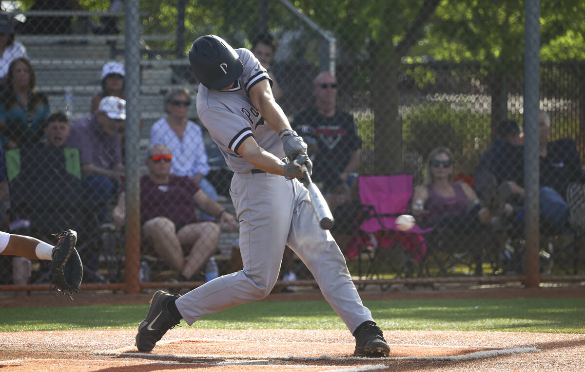 Palo Verde catcher Brady Dallimore hits a double during a baseball game at Faith Lutheran High ...