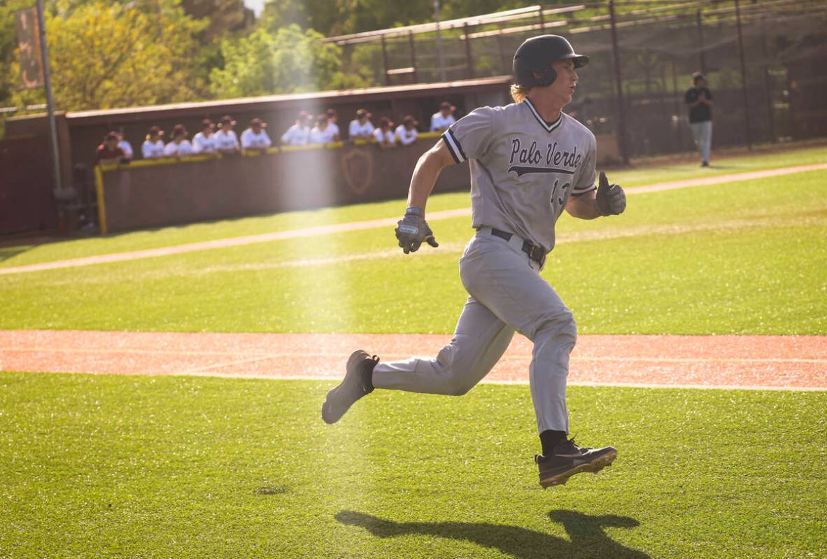 Palo Verde catcher Brady Dallimore runs bases after hitting a double during a baseball game at ...