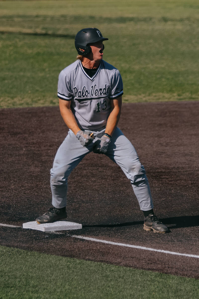 Palo Verde’s Brady Dallimore celebrates as he makes it safely to third base during a bas ...