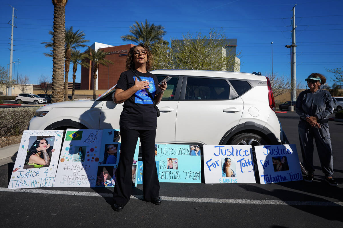 Regina Lacerda speaks during a demonstration for her daughter, Tabatha Tozzi, at Metro Headquar ...
