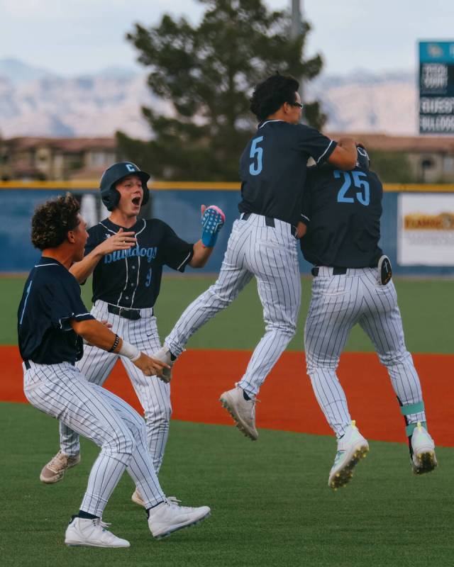 Centennial teammates Giovanni Telfer (1), Cole Curtis (9) and Noa Oyadomari (5), left, celebrat ...