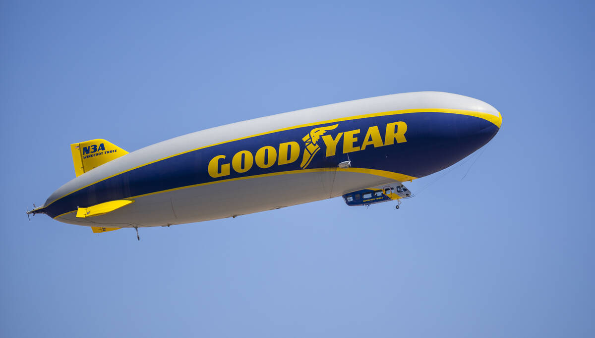 The Goodyear blimp cruises past the Strip while in town to provide aerial coverage for WrestleM ...