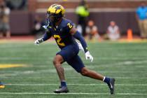 Michigan defensive back Will Johnson plays against the Texas in the first half of an NCAA colle ...