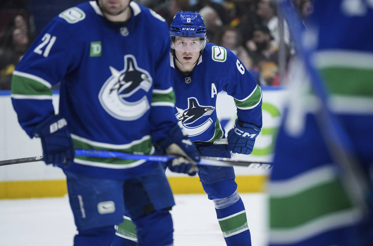 Vancouver Canucks' Brock Boeser waits for a faceoff during the second period of an NHL hockey g ...