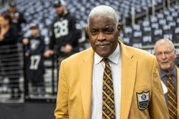 Raiders Hall of Famer Art Shell walks on the field before an NFL game between the Raiders and t ...