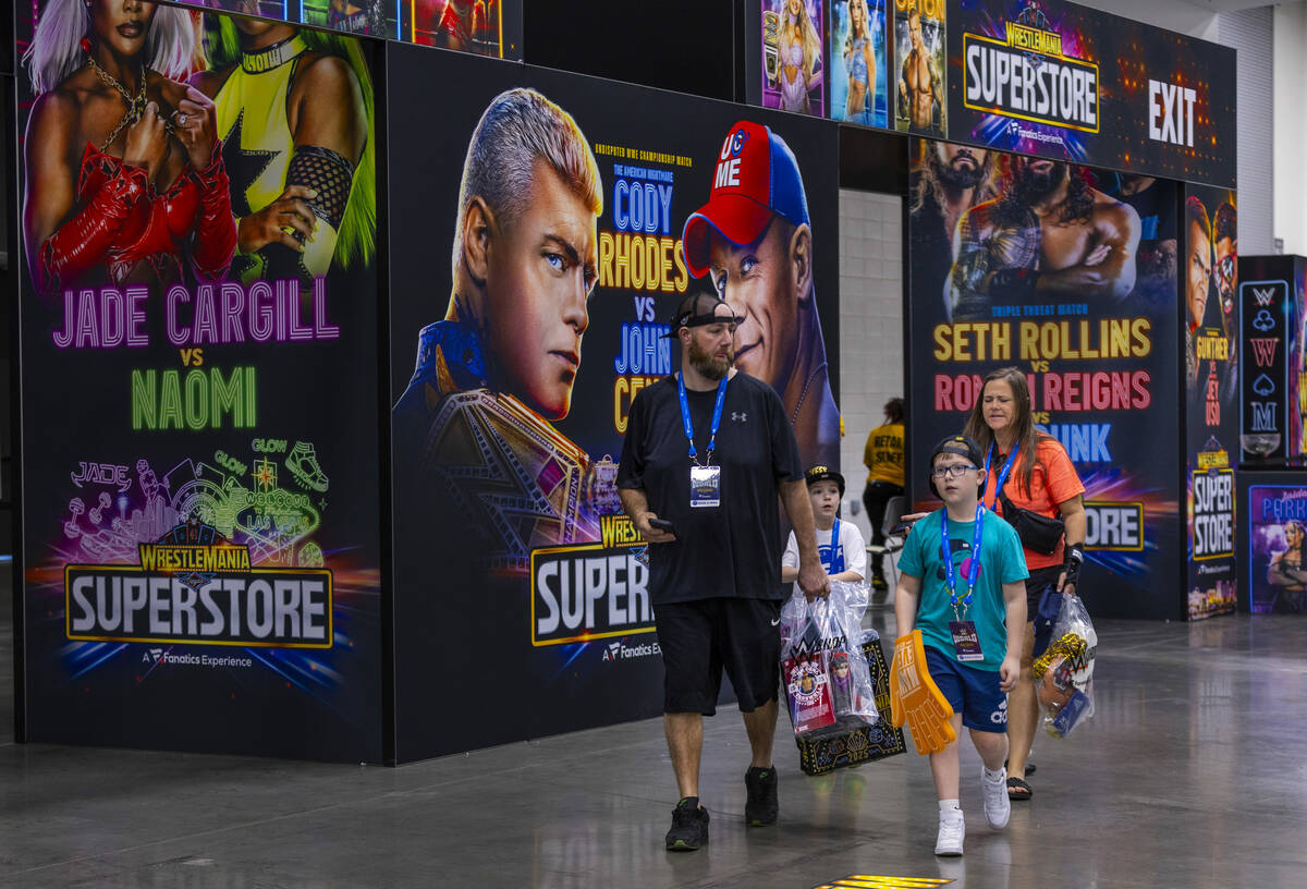 A Make-A-Wish family leaves the WrestleMania Superstore as they attend a once-in-a-lifetime exp ...