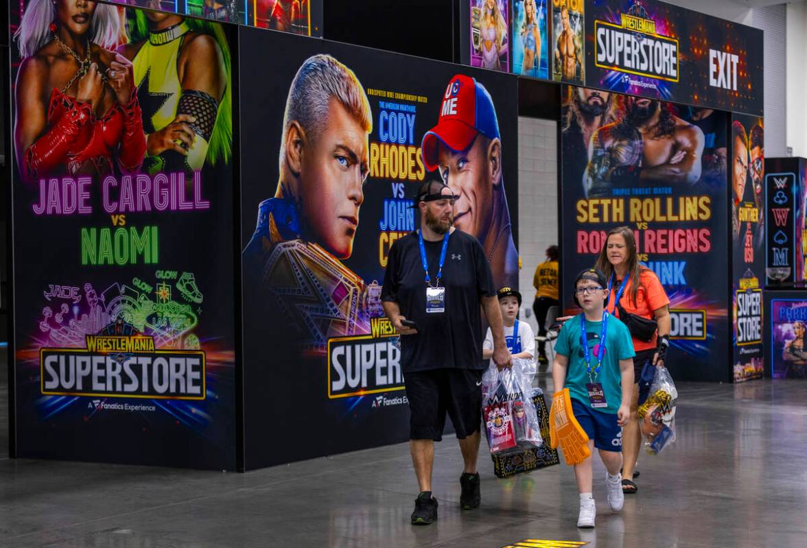 A Make-A-Wish family leaves the WrestleMania Superstore as they attend a once-in-a-lifetime exp ...