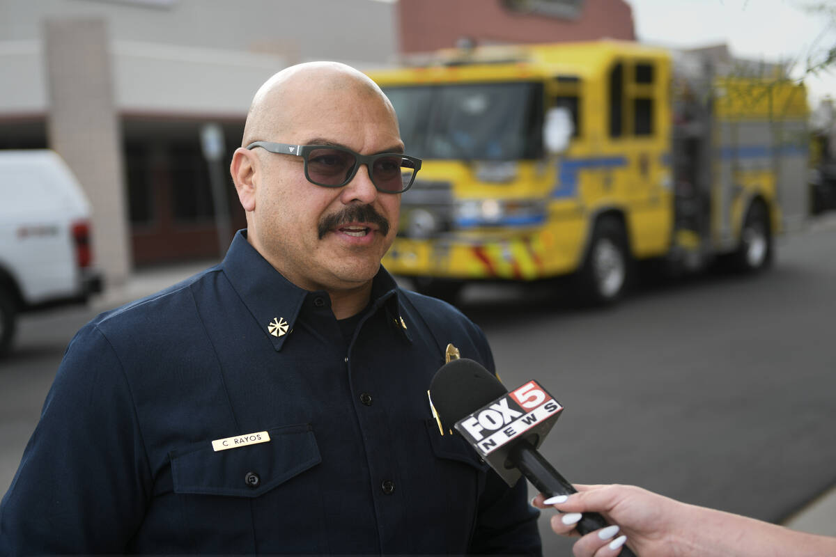 Clark County Fire Department Deputy Fire Chief Carlito Rayos briefs the media after a fire at R ...