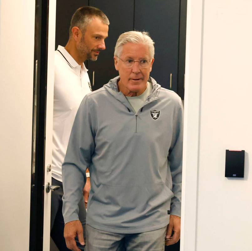 Raiders head coach Pete Carroll and General Manager John Spytek enter a media to speak at the 2 ...