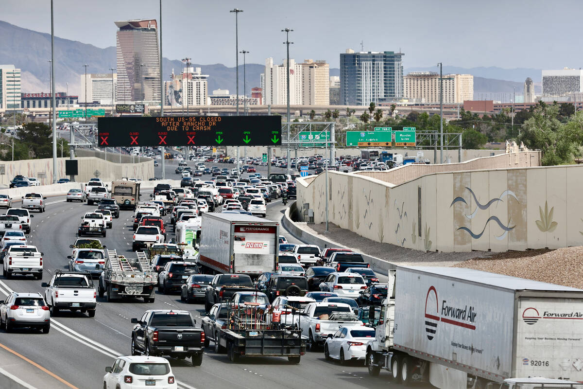 Traffic is stopped heading eastbound on I-11 towards Spaghetti Bowl from Valley View after a fa ...