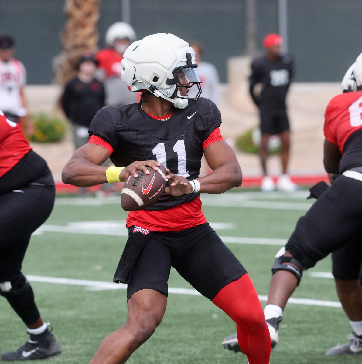 UNLV quarterback Alex Orji (11) looks to throw during a team scrimmage at Bill 'Wildcat' Morris ...