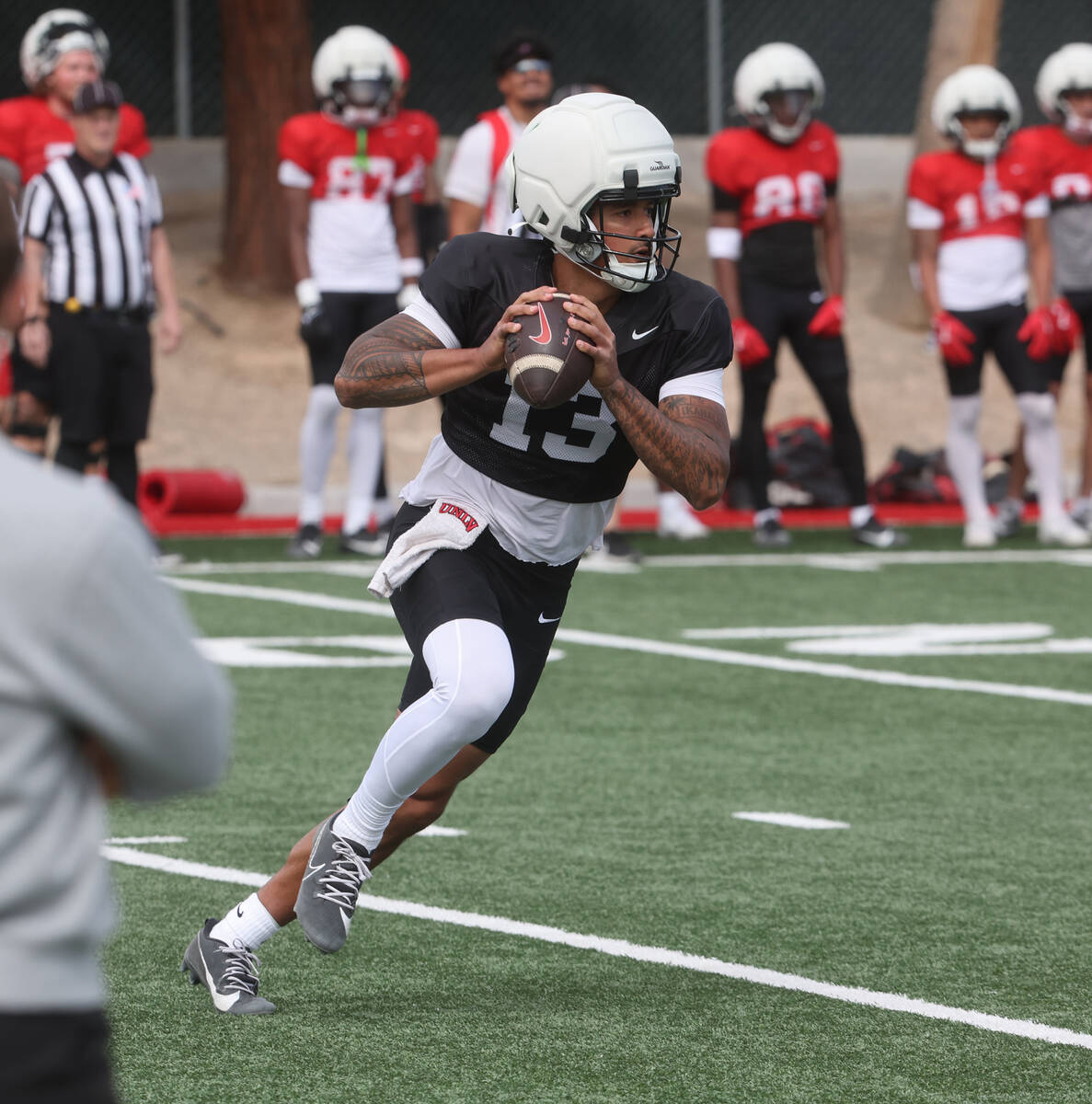 UNLV quarterback Cameron Friel (13) looks to throw during a team scrimmage at Bill 'Wildcat' Mo ...