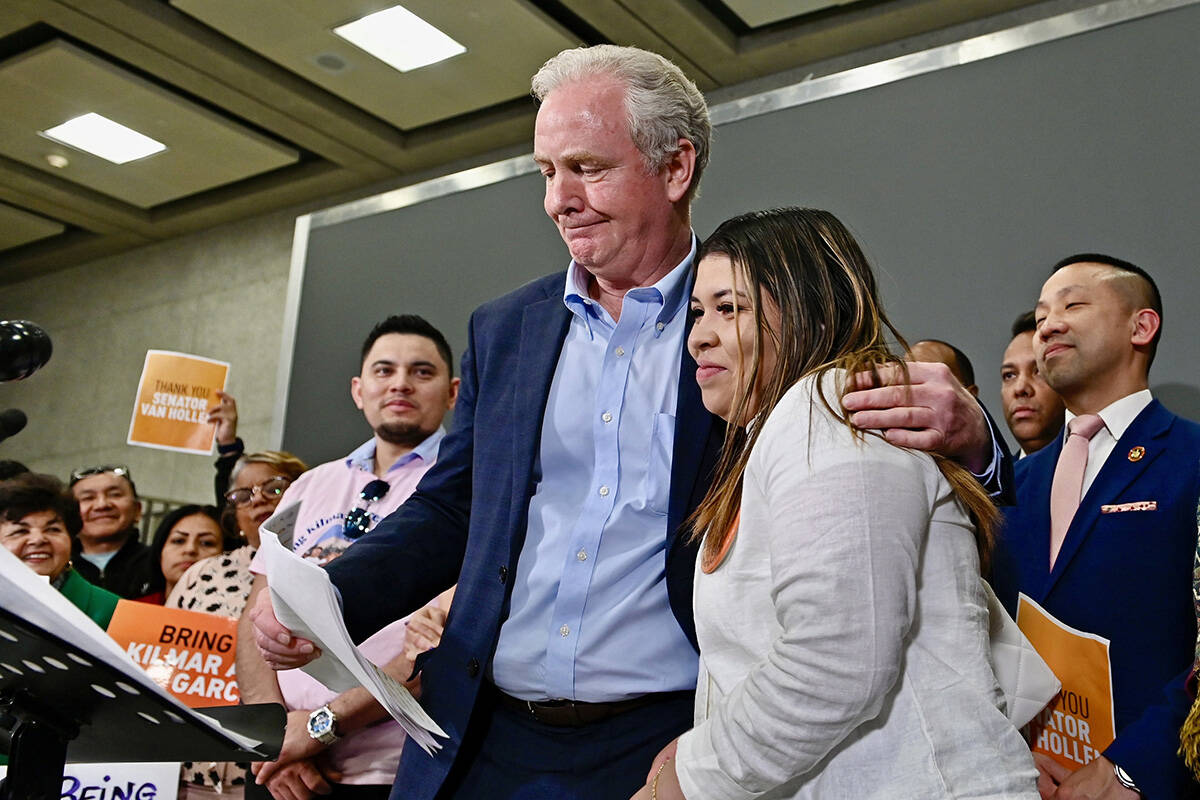 Sen. Chris Van Hollen (D-MD) speaks with media as Jennifer Vasquez Sura, wife of Kilmar Garcia, ...