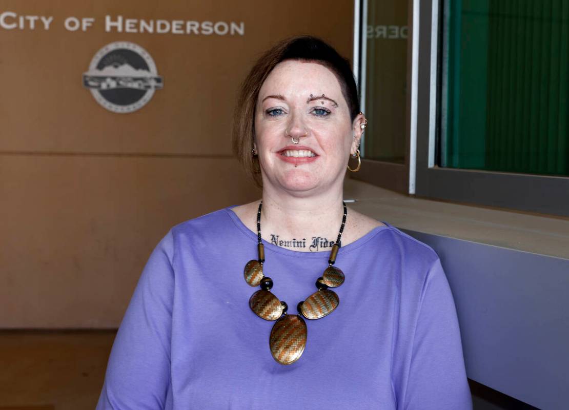 Amanda Swartz, who was recently fired from her volunteer position with Henderson police, poses ...