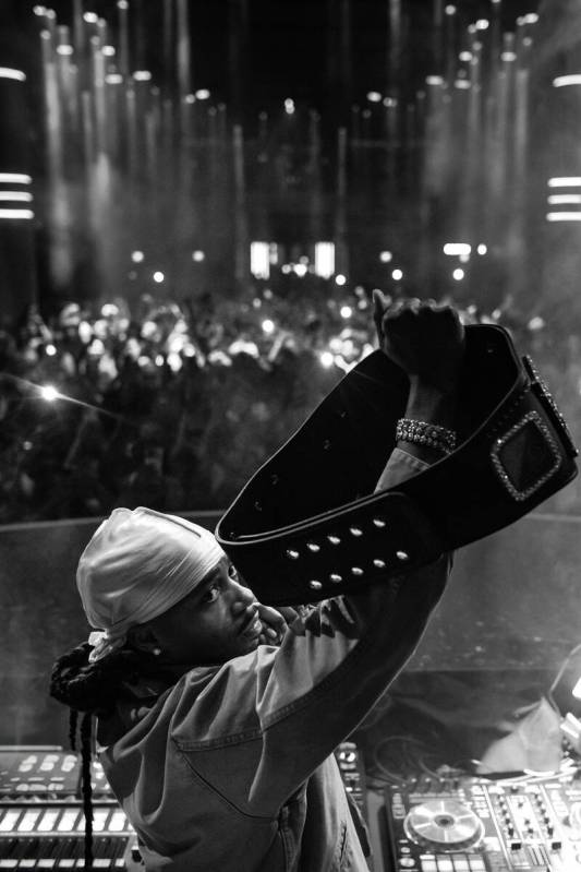Metro Boomin holds a WWE title belt during "WrestleMania After Dark" at LIV Nightclub at Fontai ...