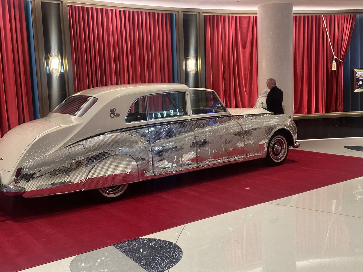 Liberace Foundation Chairman Jonathan Warren is shown with Liberace’s ‘61 Rolls Royce Phant ...