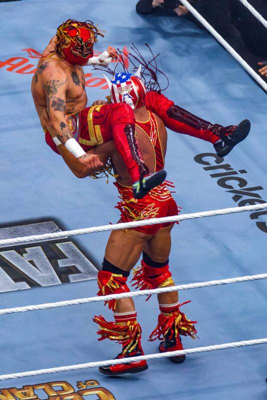 Rey Fenix is ready to be slammed down by El Grande Americano in their match during WrestleMania ...