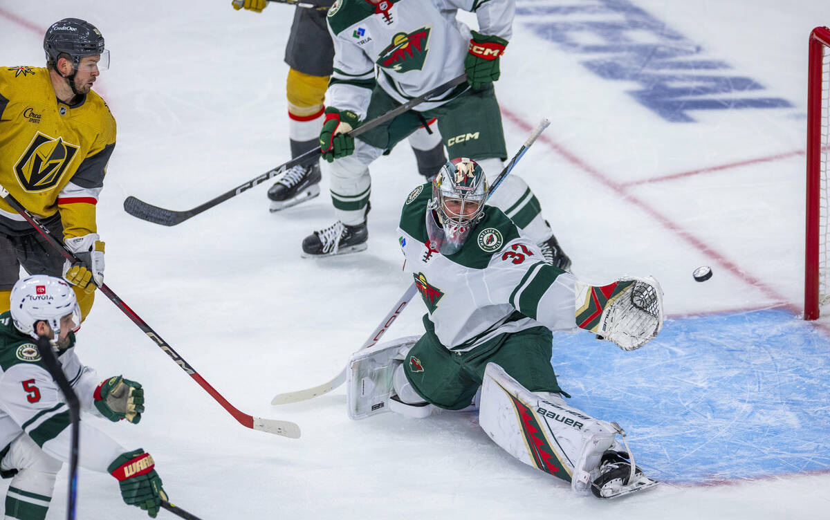 Golden Knights center Tomas Hertl (48) watches as the puck gets past Minnesota Wild goaltender ...